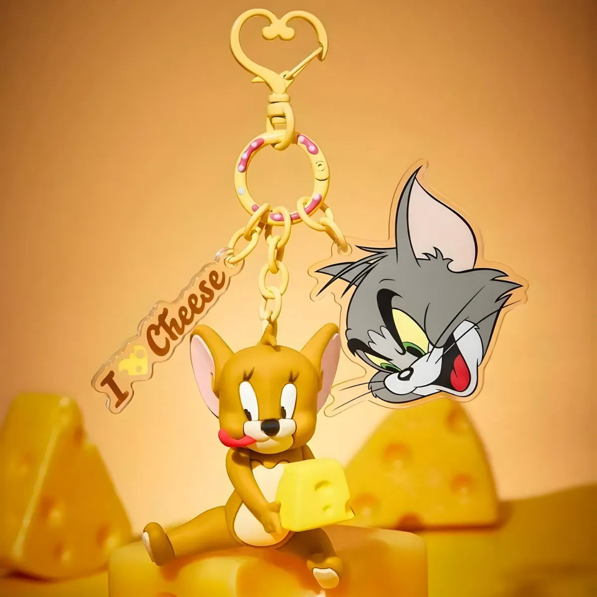 Chaveiro Tom e Jerry 3D Miniatura Queijo Dourado Rosa