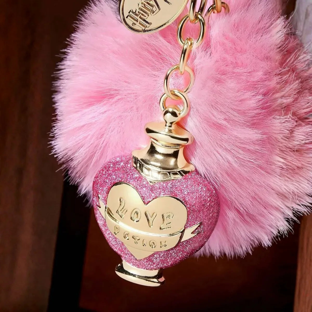 Chaveiro Harry Potter Love Potion Pompom Rosa Metal Dourado
