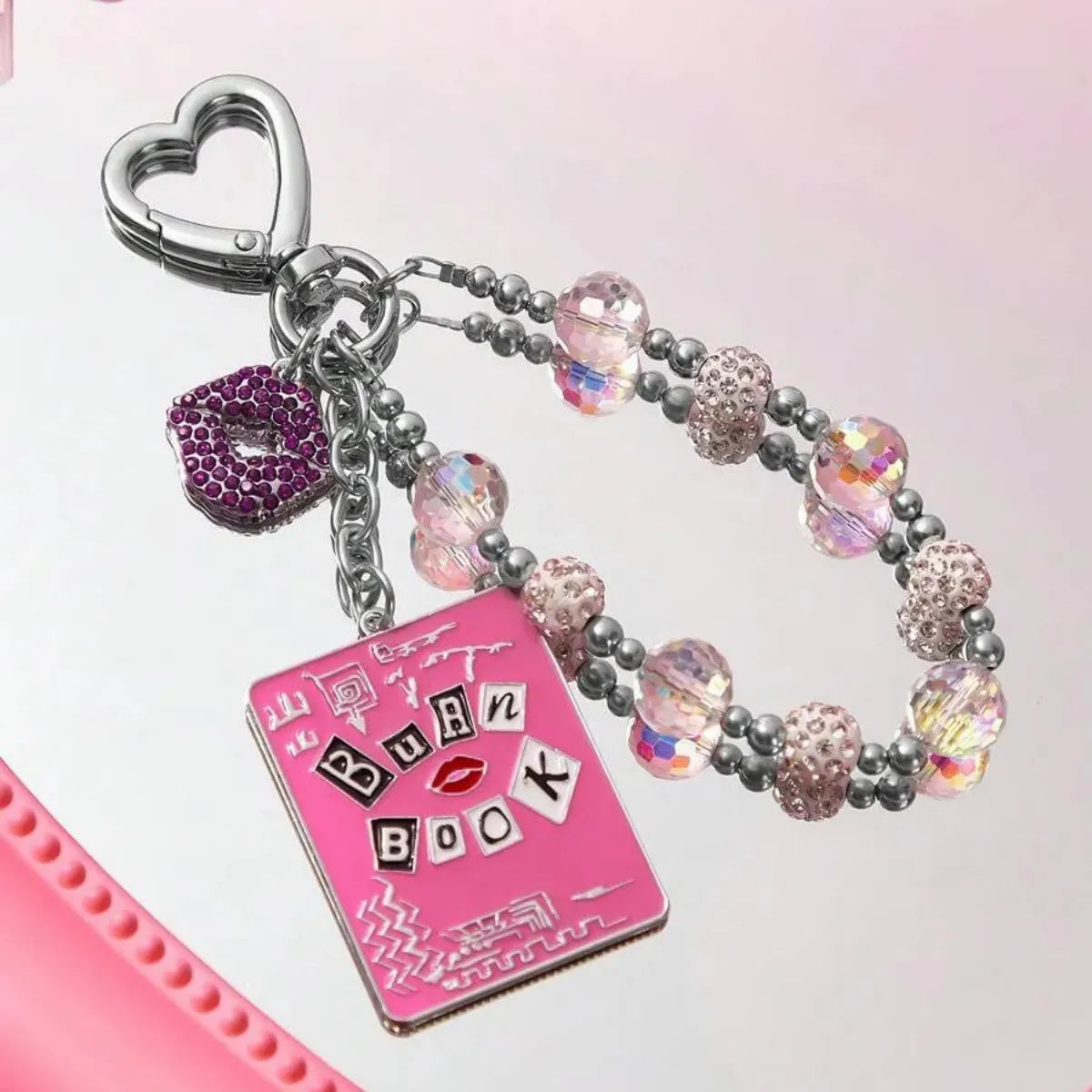 Chaveiro Mean Girls Burn Book Rosa Metal Contas Cristal